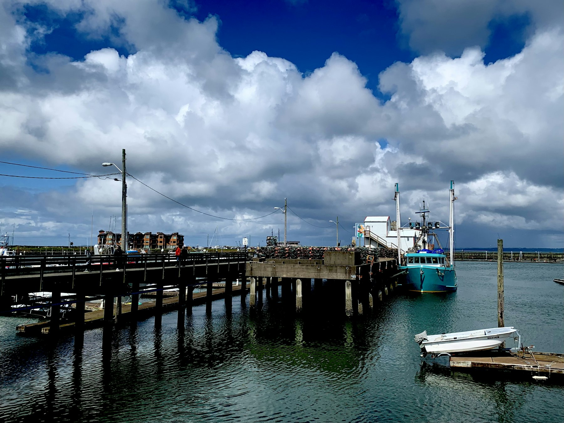 A working fishing dock on Haida Gwaii under a big coastal sky